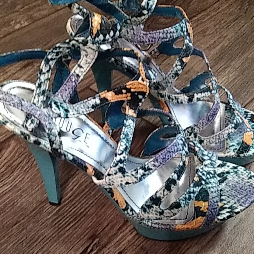 Strappy woman's high heel shoe